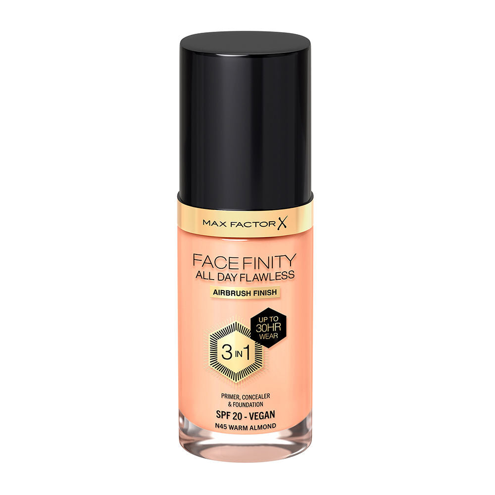 Max Factor Facefinity 3-in-1 Foundation Crystal B 33 bottle on marble surface, glass flacon with gold pump