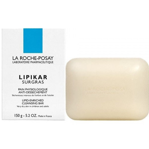 La Roche-Posay Lipikar Lipid Enriched Cleansing Bar 150g on a minimal bathroom shelf, wrapped in recyclable paper