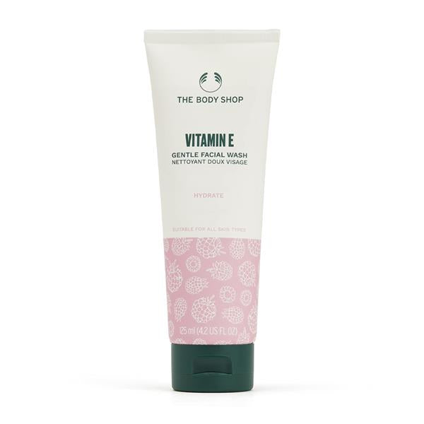 The Body Shop Vitamin E Gentle Facial Wash 125ml white tube against simple background
