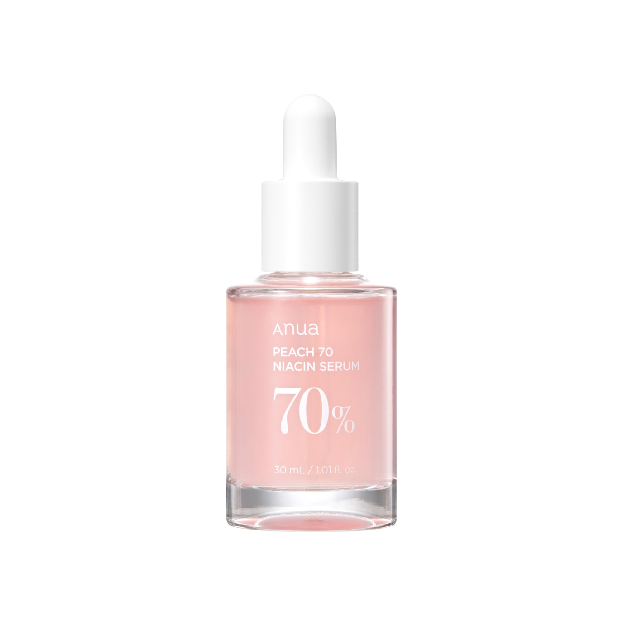 Anua Peach 70 Niacin Serum 30ml bottle on a minimalist white surface, peach-toned label visible