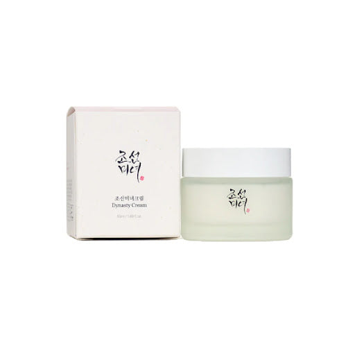 Beauty Of Joseon Dynasty Cream 50ml jar on a wooden surface with soft lighting