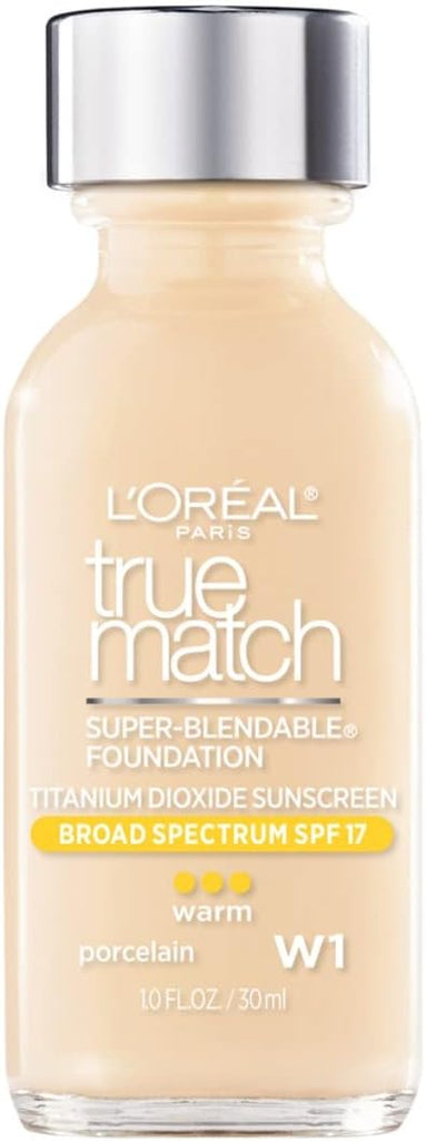 Woman applying L'Oreal True Match foundation with sponge for natural finish