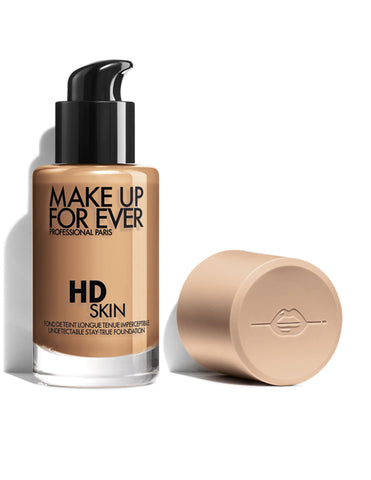 Swatch of MAKE UP FOR EVER HD Skin Foundation 2Y36 Warm Honey on a forearm showing natural finish