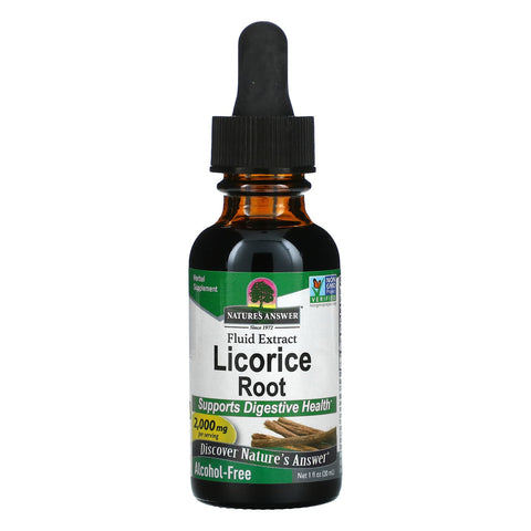 Close-up of dropper dispensing licorice root extract drops