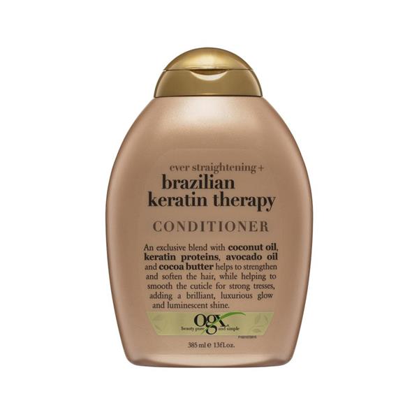 Ogx Brazilian Keratin Therapy Conditioner 385ml white bottle on marble surface