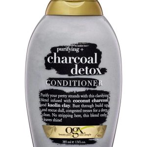 Ogx Charcoal Detox Conditioner 385ml white bottle on wooden surface