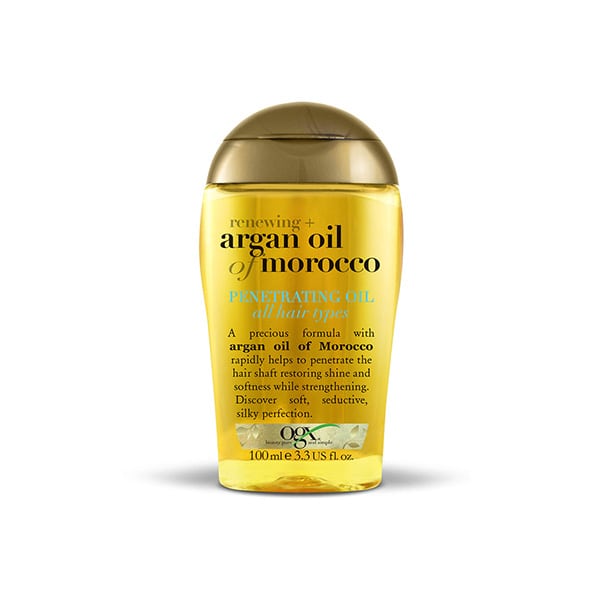 Ogx Moroccan Argan Penetrating Hair Oil in amber bottle with dropper, 100ml size on white background