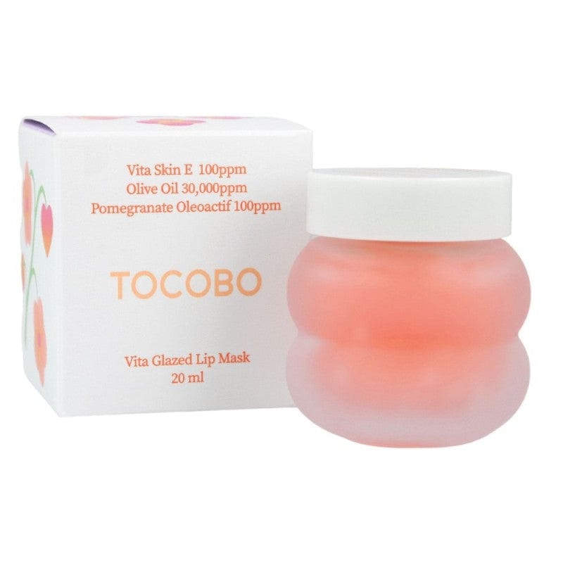 Tocobo Vita Glazed Lip Mask in a glossy white tube against a soft pink background
